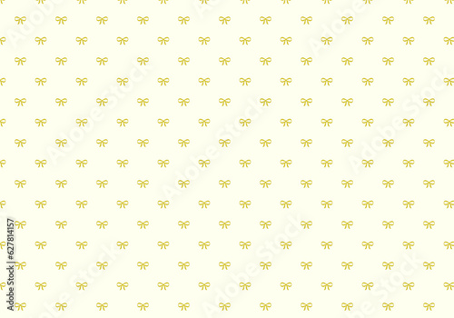 Golden bow pattern on cream background