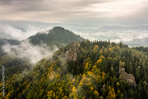 Misty mountains in Autumn - aerial shot of Sokolik in Rudawy Janowickie mountains, Poland. photo