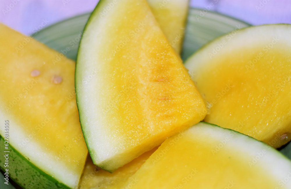 Fresh slices of yellow watermelon Fresh slices of yellow watermelon
