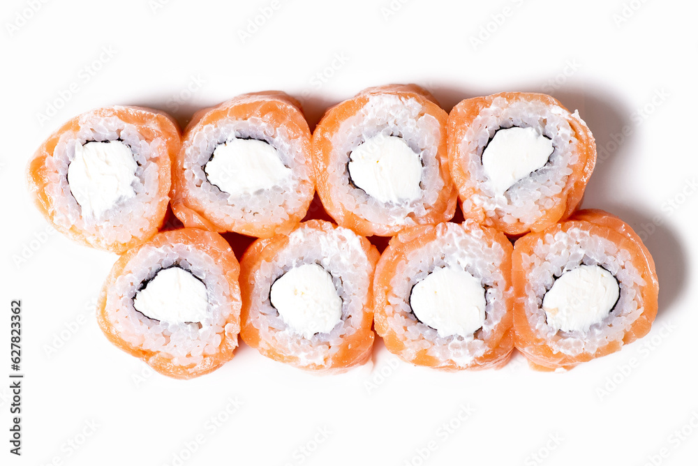 Rolls with sauce. View from above. Delicious Asian food, rolls, sushi. Isolated on white background. Culinary dish for restaurant menu Rolls with sauce. View from above. Delicious Asian food, rolls, sushi. Isolated on white background. Culinary dish for restaurant menu