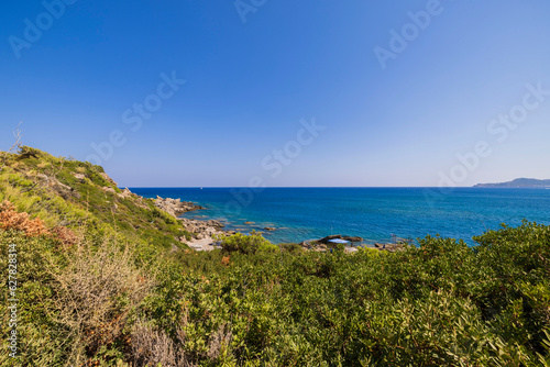 Gorgeous view from mountains to blue water of Mediterranean sea on island of Rhodes. © Alex