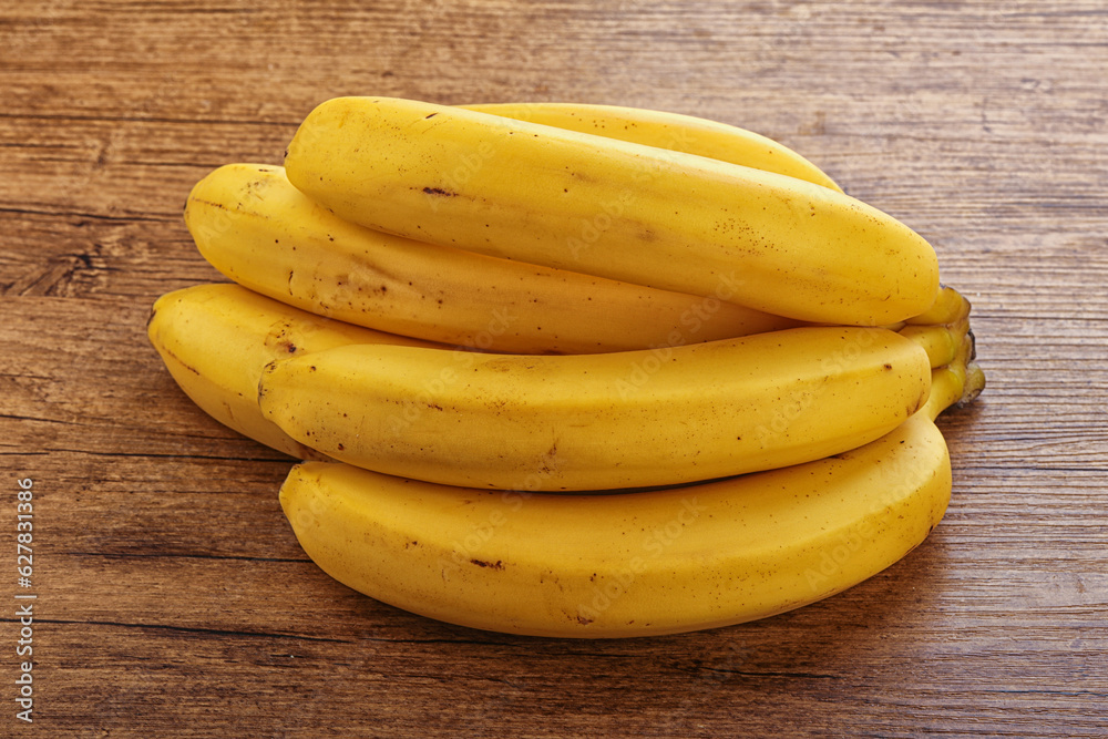 Tropical yellow banana fruit heap Tropical yellow banana fruit heap
