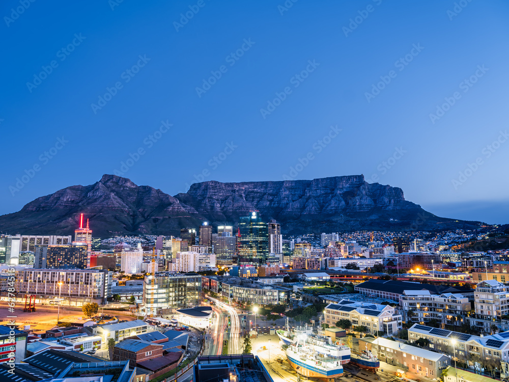Cape Town city illuminated buildings and the table mountain in the background, Cape Town, South Africa