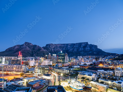 Cape Town city illuminated buildings and the table mountain in the background, Cape Town, South Africa