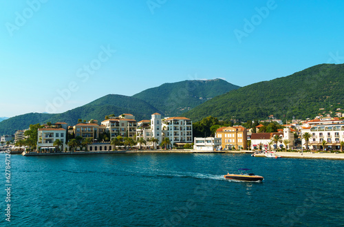 seascapes, a view of the Bay of Kotor during a cruise on a ship in Montenegro, a bright sunny day, mountains and small towns on the coast, the concept of a summer trip © soleg