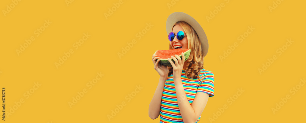 Summer portrait of happy smiling young woman with fresh juicy slice of watermelon wearing straw hat on yellow background Summer portrait of happy smiling young woman with fresh juicy slice of watermelon wearing straw hat on yellow background