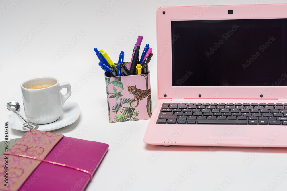 Fototapeta premium laptop and coffee,Working with a laptop computer, hot coffee on a white background. Top view, flat lay, Minmal style workspace, business concept,office workplace, blogging flat lay background. 