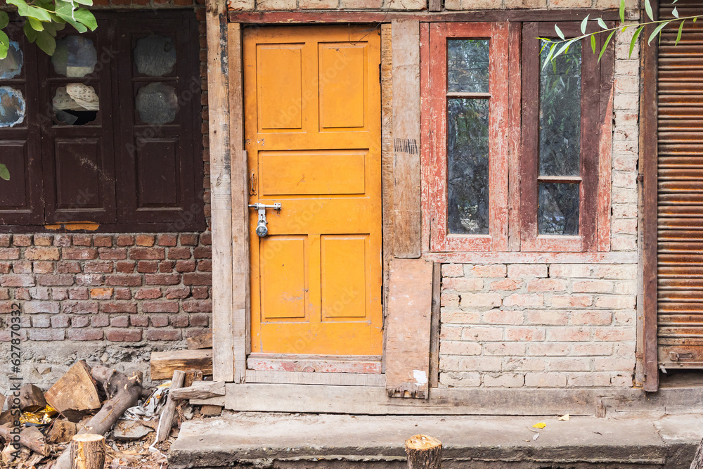 Yellow door in a brick house in Srinagar. Yellow door in a brick house in Srinagar.