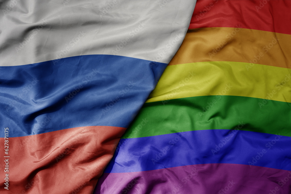 big waving realistic national colorful flag of russia and rainbow gay pride flag .