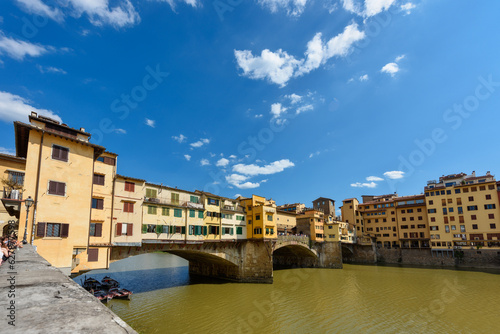 Florence, Italy - June 28, 2023: Florence, Italy on the Arno River. View of Ponte Vecchio bridge. © nedomacki