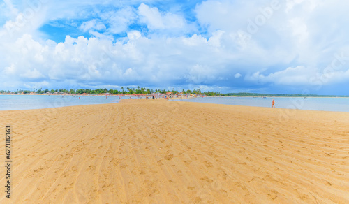 View of the sand path of Coroa Vermelha beach  tourist destination of Bahia state at Santa Cruz Cabralia city. 
