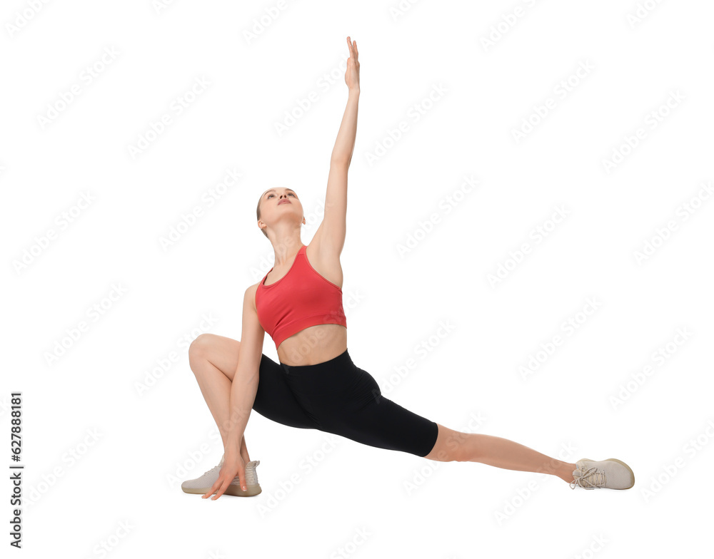 Yoga workout. Young woman stretching on white background