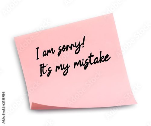 Sticky note with phrase I Am Sorry! It's My Mistake on white background