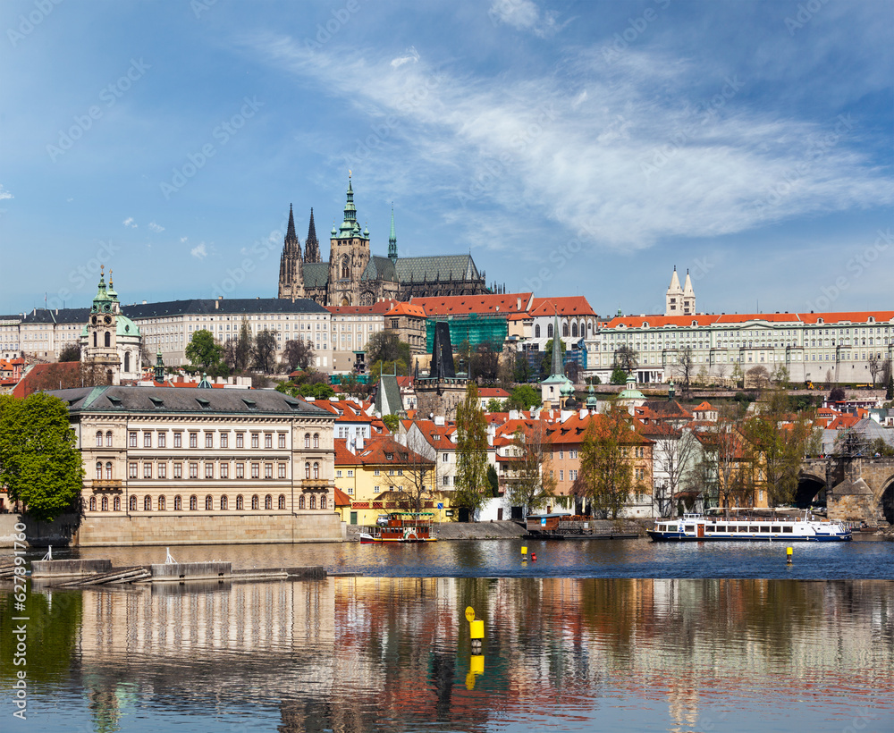 Fototapeta premium View of Charles bridge over Vltava river and Gradchany (Prague Castle) and St. Vitus Cathedral