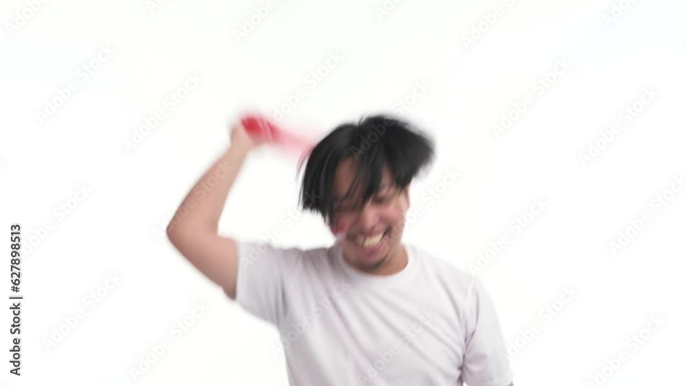 Indonesian man supporting with spirited expression Indonesian man supporting with spirited expression