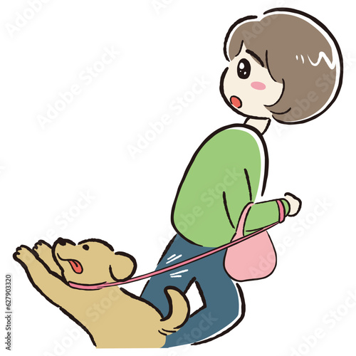 犬の散歩をしながら何かに注目する女性