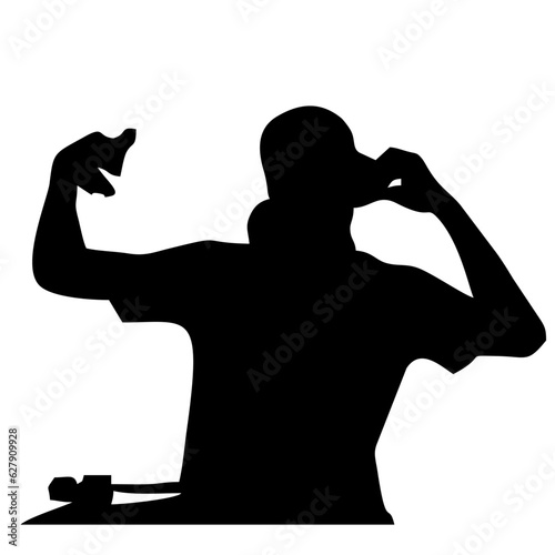 silhouette of a DJ
