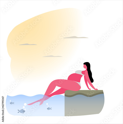 young pregnant woman rinsing her legs in the sea while sitting on the pier.Health and sports for pregnant women.
