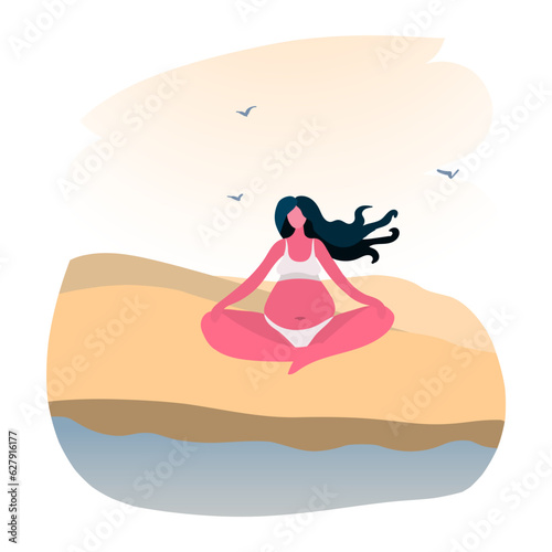 young pregnant woman meditating on the beach