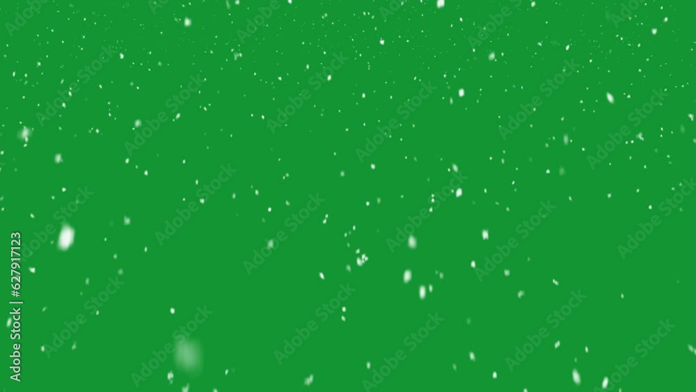 Snow falling on green background Snow falling on green background