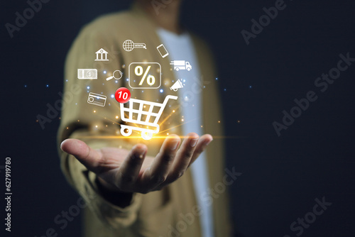 Photographie Man or customer add products to card while online shopping at store