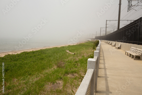 Pedestrian walkway on the beach at Cini Park in Connecticut. photo