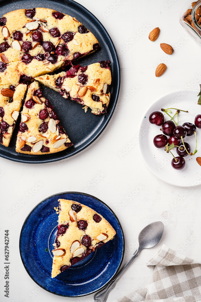 Fotografie Homemade cherry cake with almond nuts