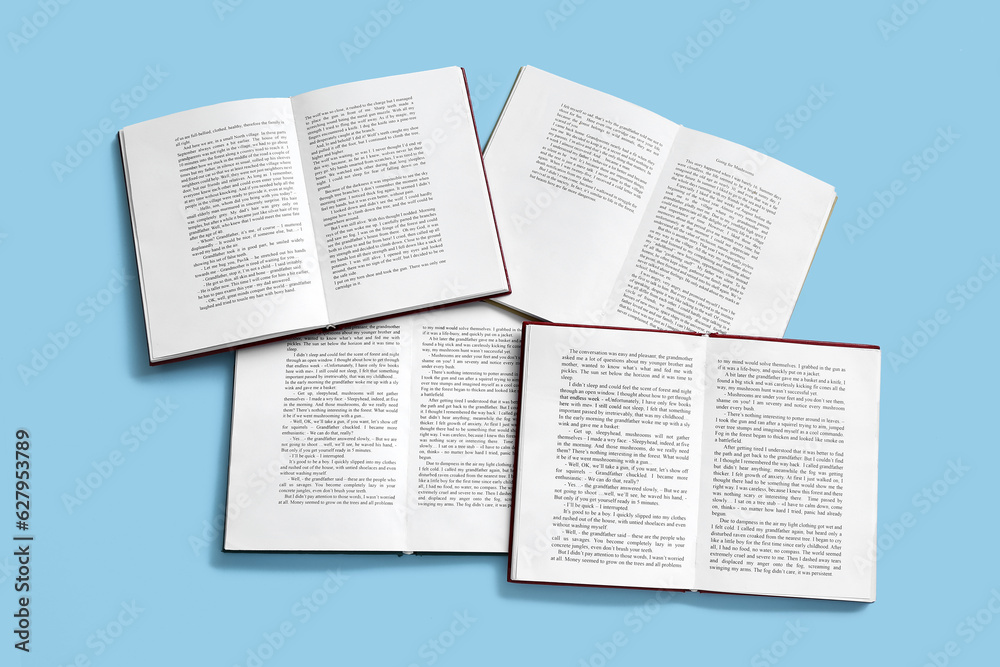 Obraz premium Open books on blue background