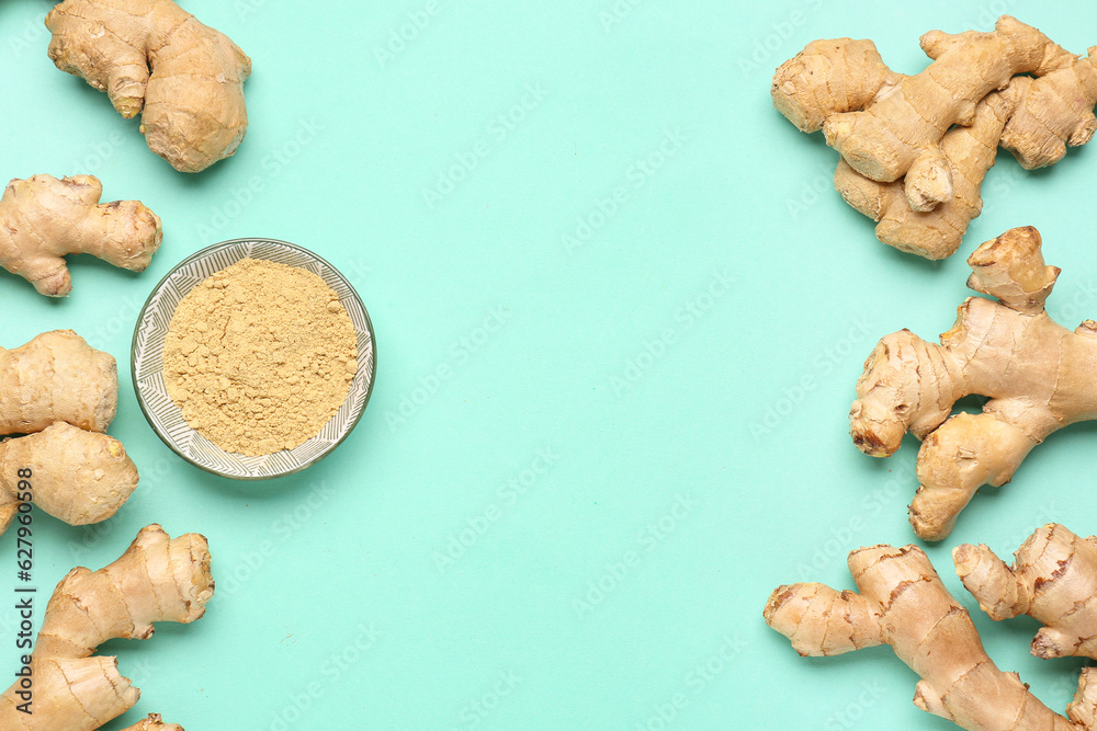 Fototapeta premium Fresh ginger roots and bowl with dried powder on turquoise background