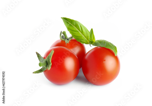 Cherry tomatoes and green fresh organic basil Isolated on white 