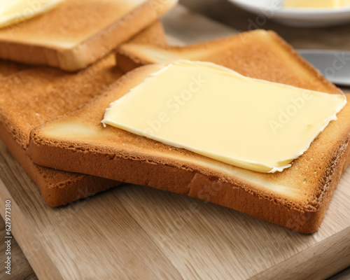 Cutting board with toasts and butter, closeup MADE OF AI