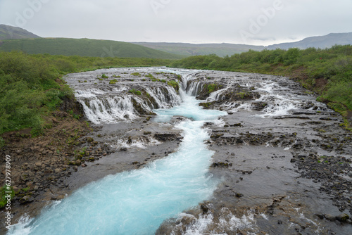 Bruarfoss waterfall in summer season in Iceland. Famous nature landscape background