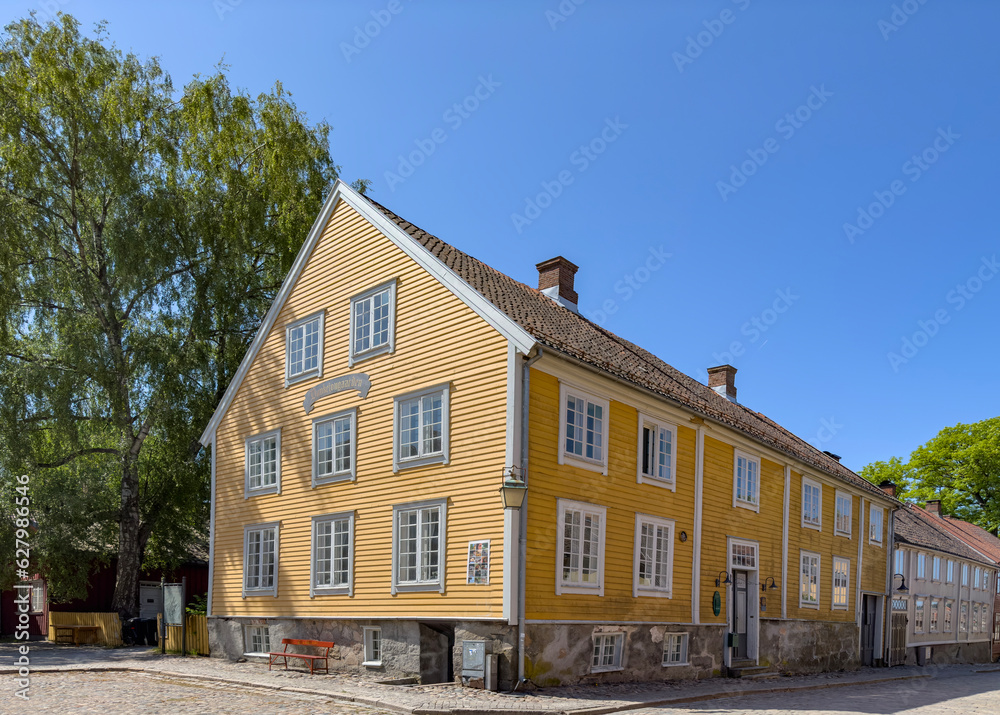 Happy walking in old Fredrikstad on a great warm summer day, with many old buildings, Norway Happy walking in old Fredrikstad on a great warm summer day, with many old buildings, Norway