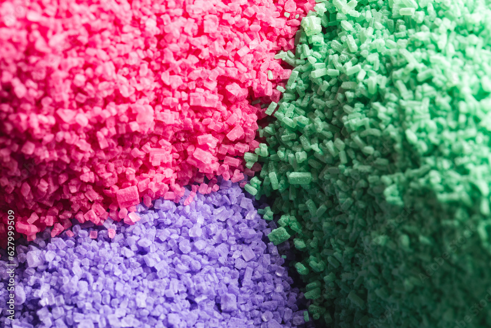 Close up of heaps of multi coloured sand