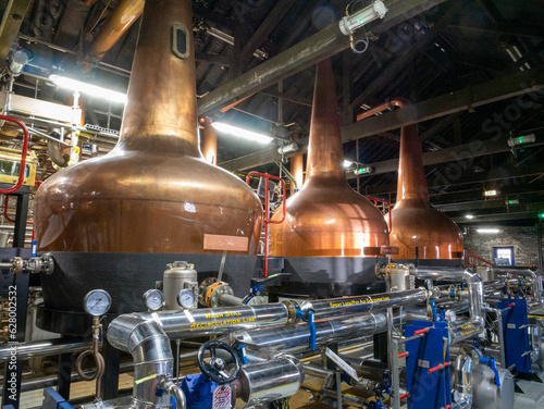 Canvastavla Industrial whiskey distiller construction, alcohol production factory interior b