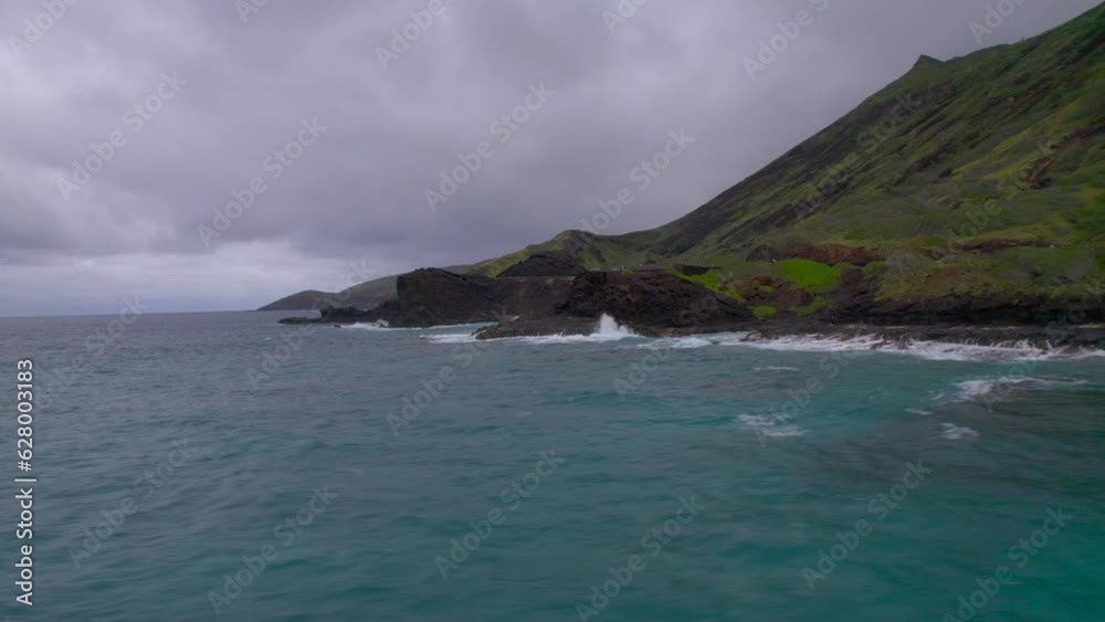 Oahu Hawaii coast with Sandy Beach Halona Blowhole Lookout and Koko Crate at sunrise. 4k drone. Oahu Hawaii coast with Sandy Beach Halona Blowhole Lookout and Koko Crate at sunrise. 4k drone.
