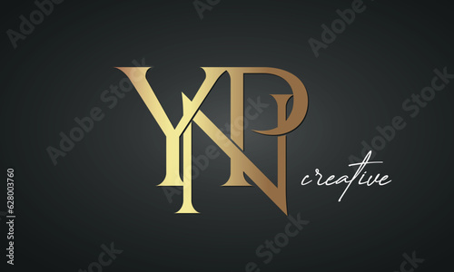 luxury letters YNP golden logo icon premium monogram, creative royal logo design photo