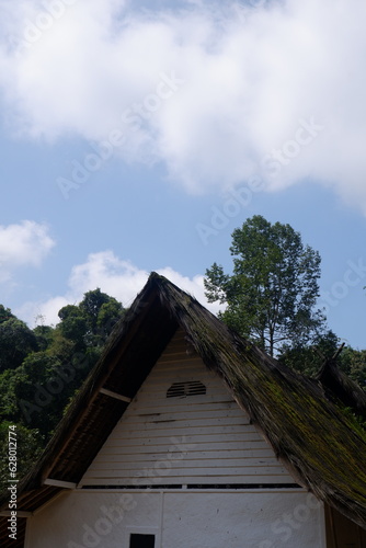 A traditional house with a unique architecture, made of wood and bamboo with a roof of palm fiber in Kampung Naga