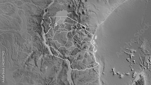 Shape of Tanzania with regional borders. Grayscale. photo