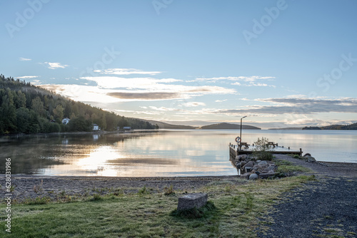 Sunrise at pier near the sea at skuleberget campsite caravan camping in Hoga Kusten Sweden Sunset photo