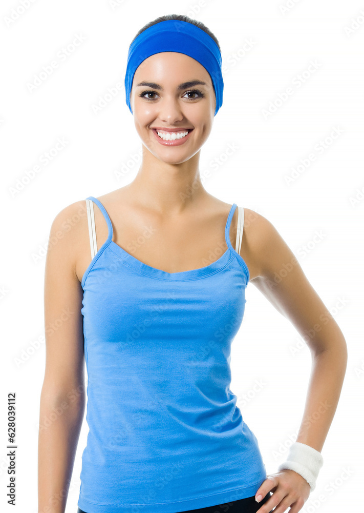 Young cheerful woman in fitness wear, isolated over white background