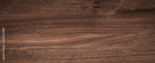 Walnut wood texture background. Wide format black walnut natural texture desktop background. 
