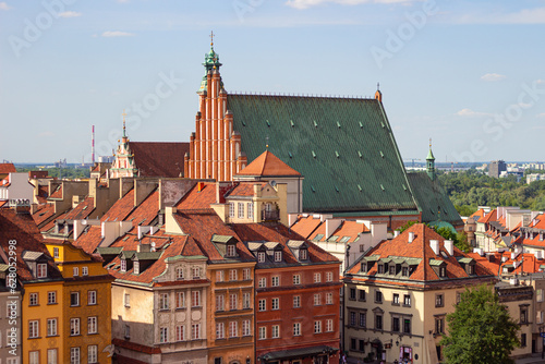 Aerial view of historical buildings on Castle square (aka Plac Zamkowy) and archcathedral Basilica of the Martyrdom of St. John the Baptist in Warsaw Old Town, Poland	 photo
