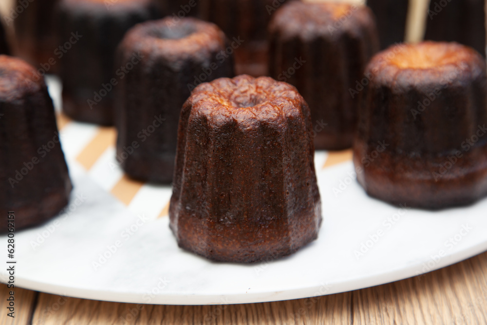 Canele, a small french pastry flavored with rum and vanilla Canele, a small french pastry flavored with rum and vanilla
