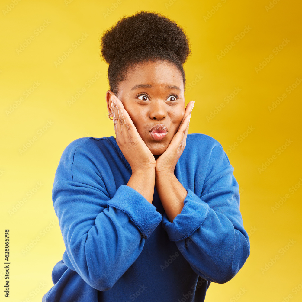 Φωτογραφία Wow, excited and hands on face of black woman in studio with news, deal or giveaway promo on yellow background