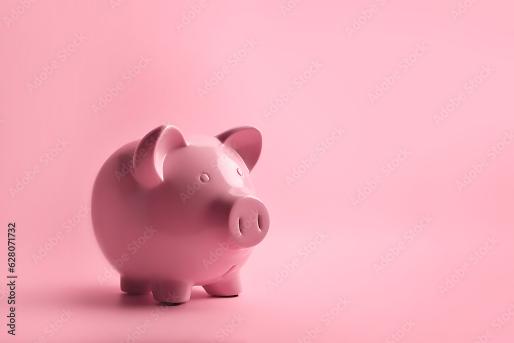 Piggy bank on a pink background with copy space. Finance, business, budgeting, economics. World crisis, economical regress, depression. Money saving, budget, financial advice 
