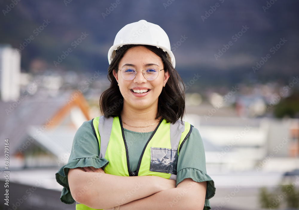 Engineering, crossed arms and portrait of a female construction worker on a building rooftop. Confidence, industry and woman industrial manager for maintenance, renovation or inspection in the city. Engineering, crossed arms and portrait of a female construction worker on a building rooftop. Confidence, industry and woman industrial manager for maintenance, renovation or inspection in the city.