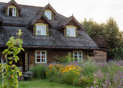 Old large wooden house with beautiful grounds in a polish village. House in Podlaskie Voivodeship Style which is on Northern Poland.