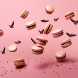 Colored French macarons flying in freeze motion. Concept of flying food isolated on background. High resolution image