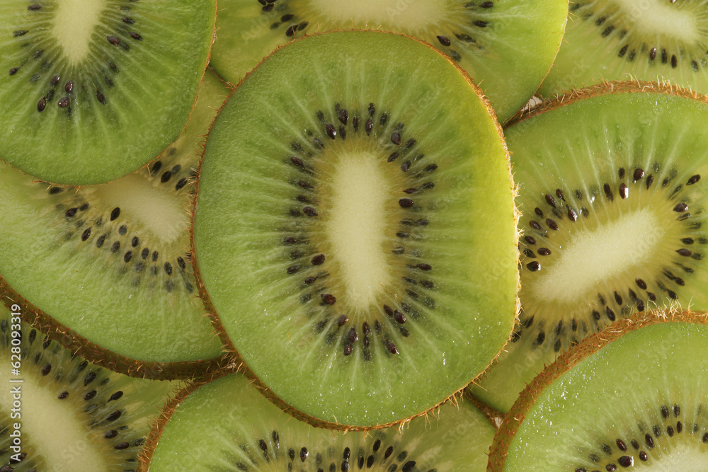Close up of sliced kiwi fruit. Kiwi isolated on white background, stacked with clipping path. Kiwi have juice rich in vitamins and energy. Fresh fruits concept. Close up of sliced kiwi fruit. Kiwi isolated on white background, stacked with clipping path. Kiwi have juice rich in vitamins and energy. Fresh fruits concept.